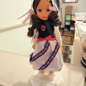 Adorable Doll with Embroidered Dress